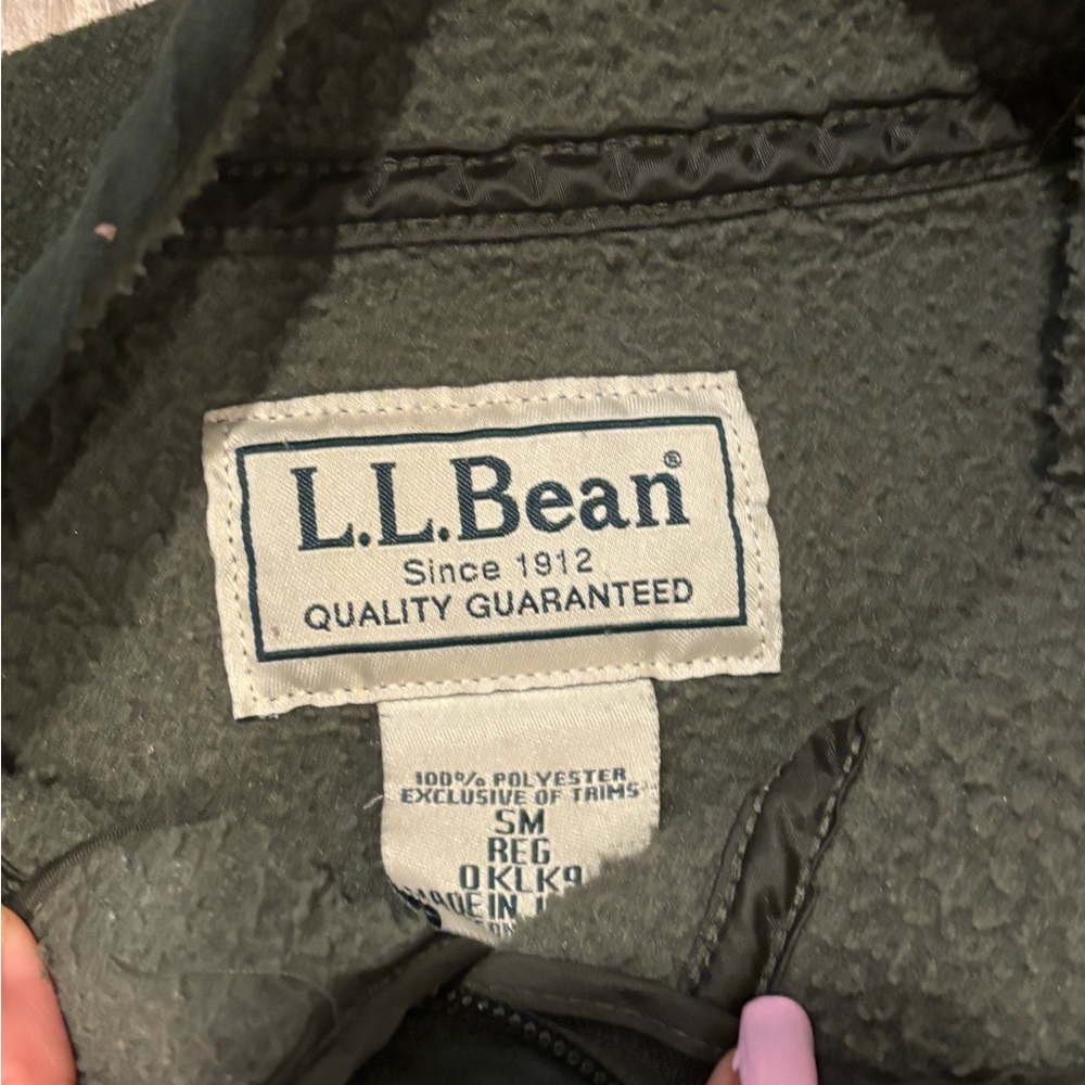 Green sweater that was thrifted good condition and very comfortable!